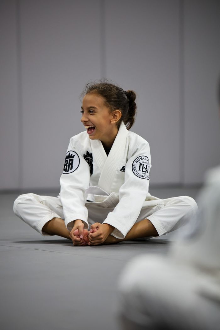 A young student drilling technique with focus during a Brabus Academy class