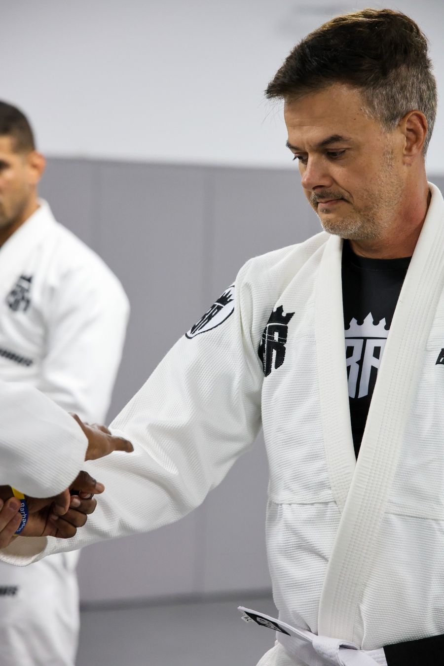 Adult students rolling during open mat at Brabus Academy
